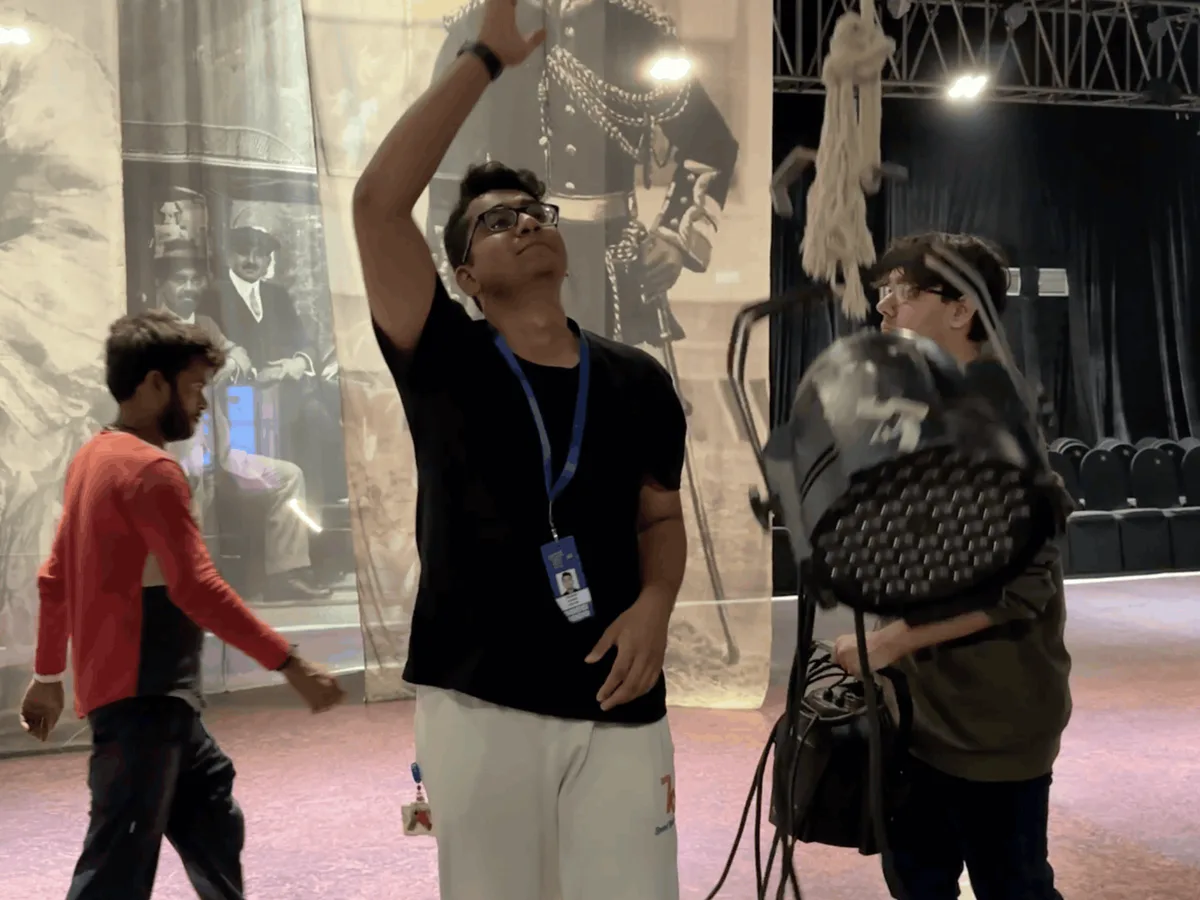 IIED lighting students rigging fixtures during an internship